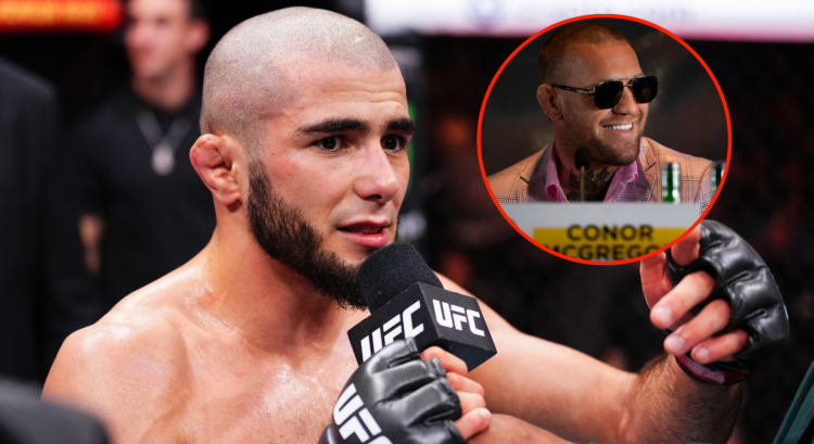 Muhammad Mokaev talking on the mic following his UFC 304 win with a pop out image of Conor McGregor at the BKFC Spain press conference