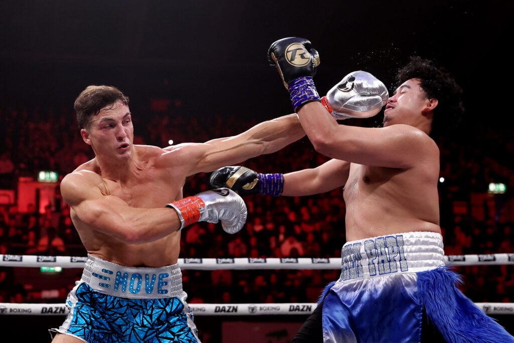 Josh Brueckner punches Salt Papi in their boxing fight