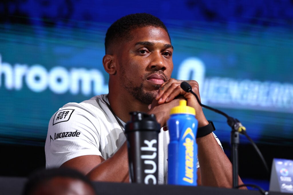 Anthony Joshua on stage at a press conference to announce his fight with Daniel Dubois