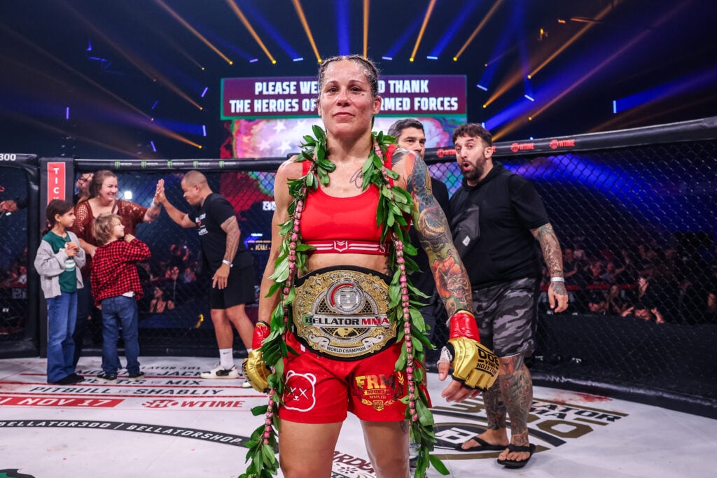 Liz Carmouche with the Bellator title belt