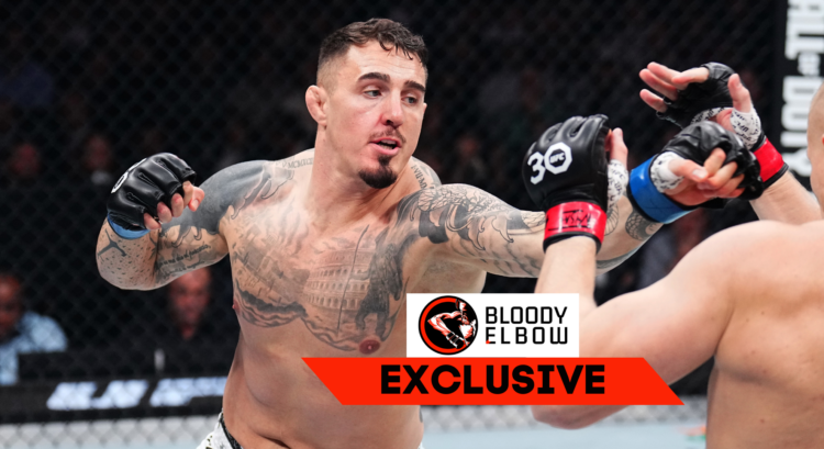 Tom Aspinall throwing a punch, with an overwrite text that reads 'Bloody Elbow Exclusive'