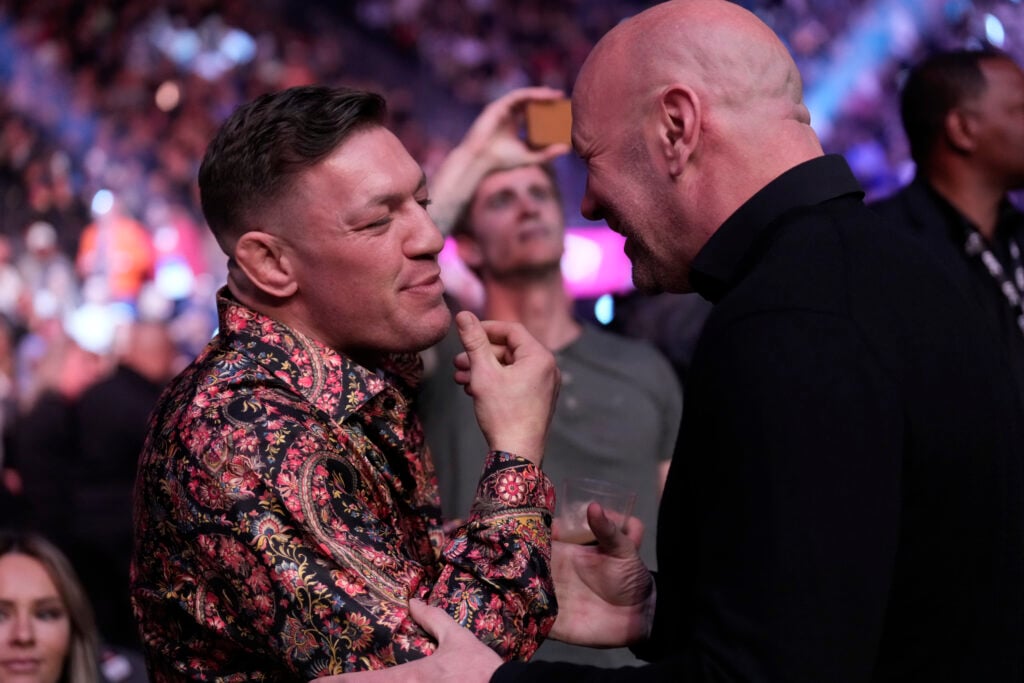 Conor McGregor and Dana White shaking hands