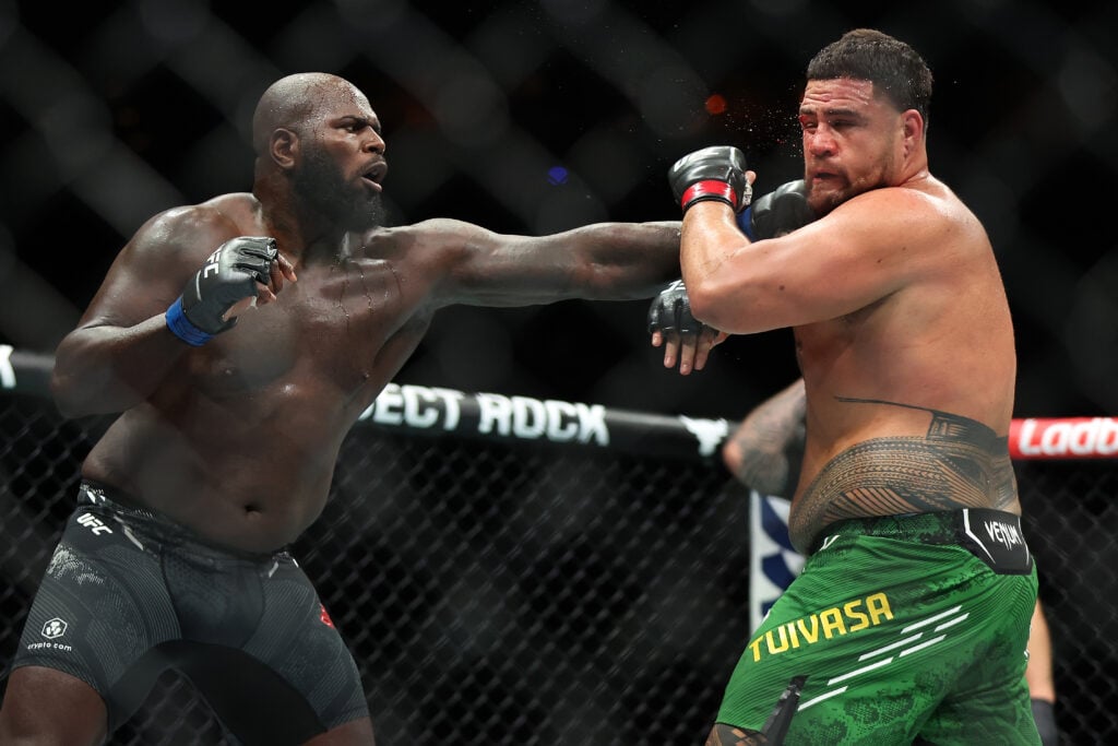 Jairzinho Rozenstruik lands a punch on Tai Tuivasa during UFC 305