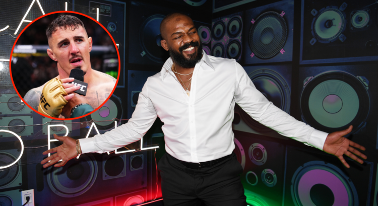 Jon Jones at the grand opening of Flanker Kitchen & Sports bar with a pop out image of Tom Aspinall