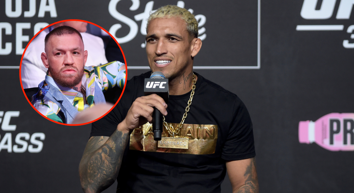 Charles Oliveira at UFC 301 ceremonial weigh-ins with a pop out image of Conor McGregor (left)