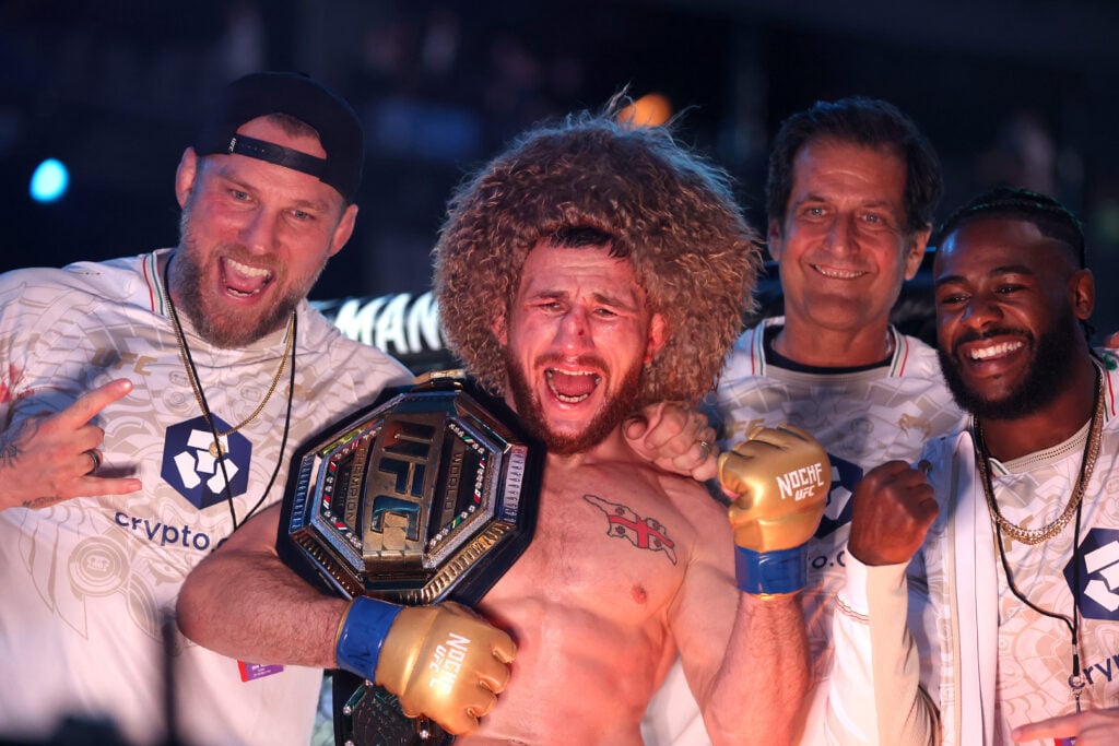 Merab Dvalishvili with his team after winning at UFC 306
