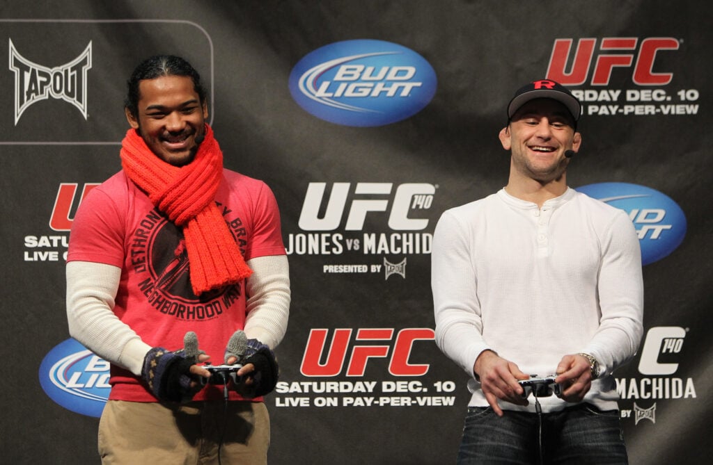Benson Henderson (Left) and Frankie Edgar (Right) on stage at the UFC 140 weigh-ins
