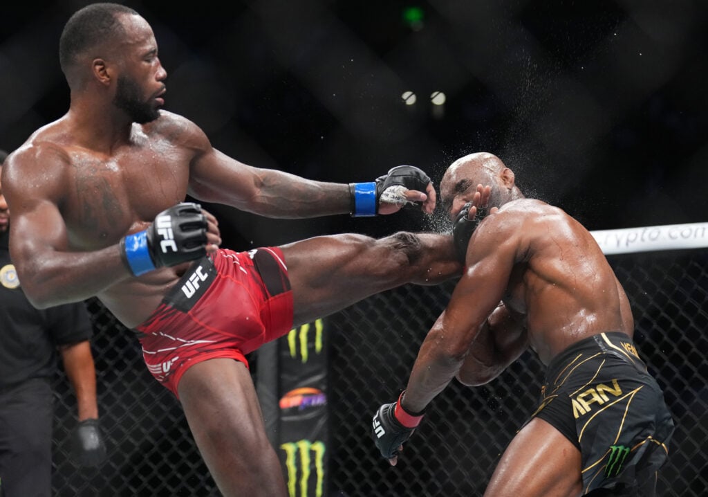 Leon Edwards lands a head kick on Kamaru Usman at UFC 278.