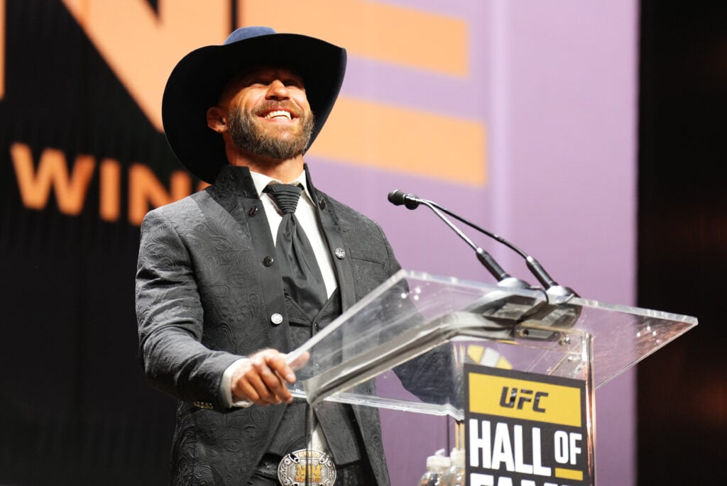 Donald Cerrone speaks on stage at the UFC Hall of Fame induction ceremony in 2023