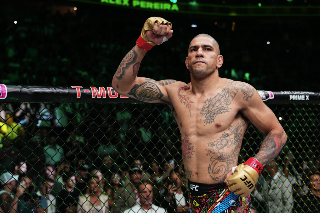 Alex Pereira with his fist raised