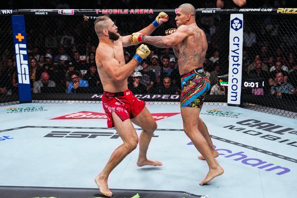 Alex Pereira punches Jiri Prochazka at UFC 303