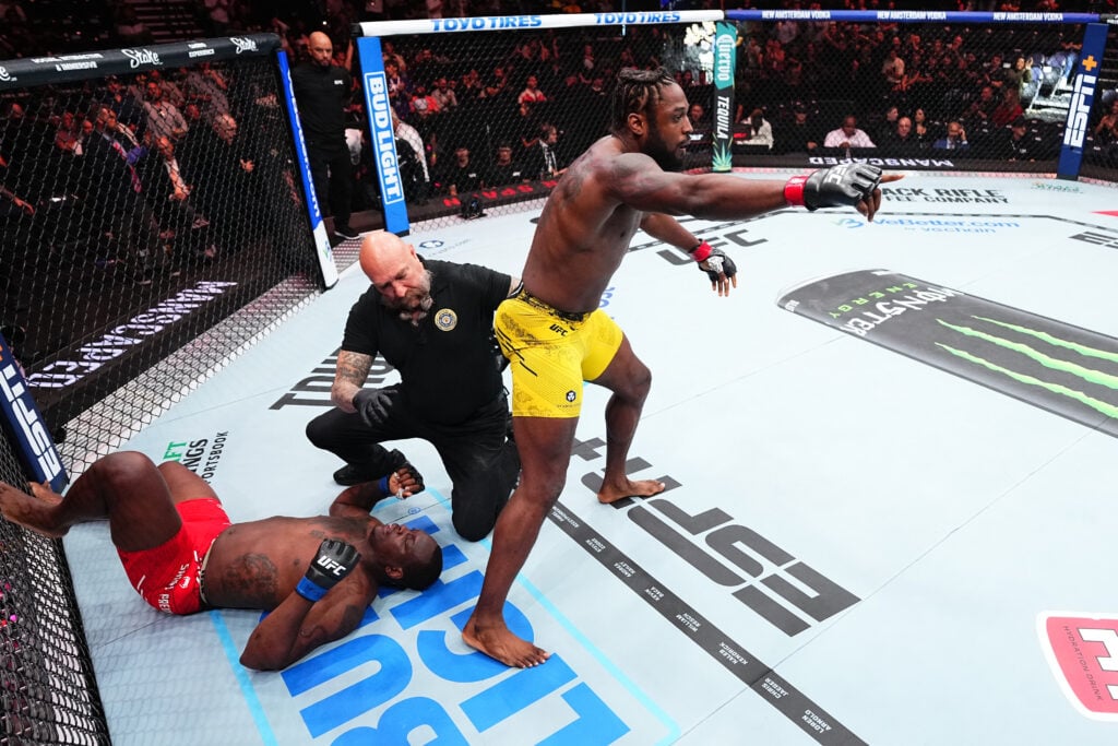 Ryan Spann stands over Ovince St-Preux after submitting him at UFC 307