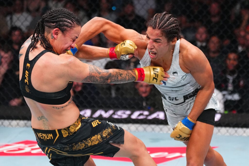 Julianna Pena punches Raquel Pennington at UFC 307