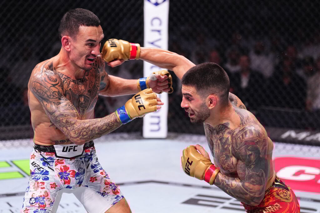 Ilia Topuria lands a big shot on Max Holloway during their UFC 308 fight