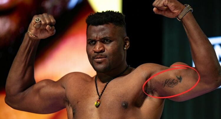 Francis Ngannou flexes on the scale after making weight for his PFL debut