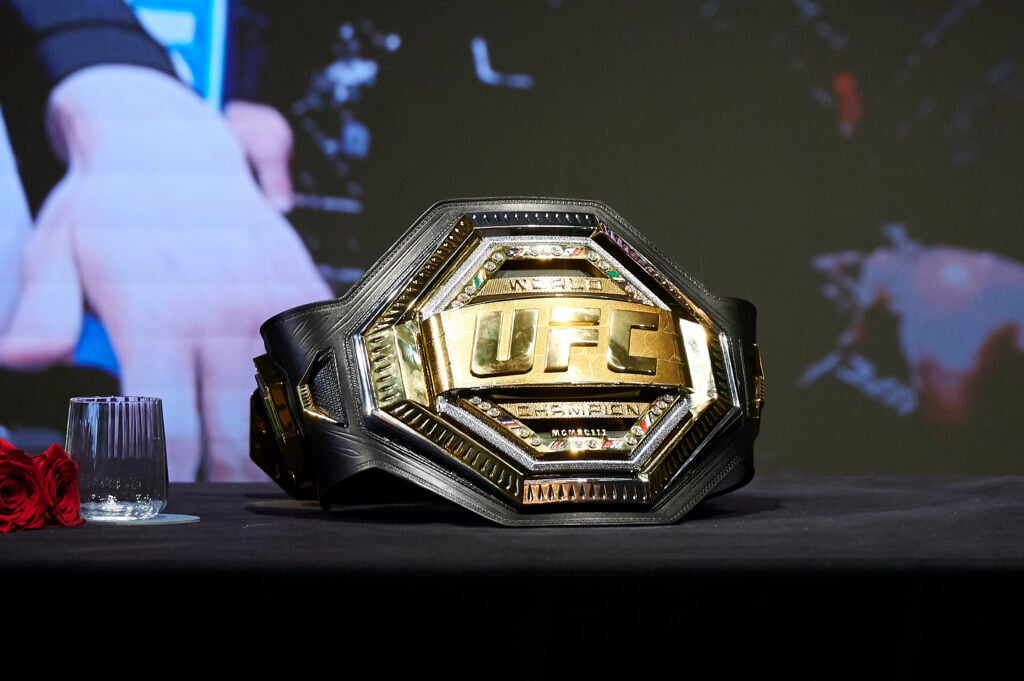 Detail view of Ilia Topuria's championship belt
