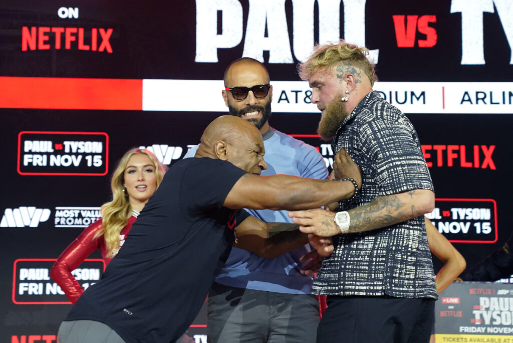 Mike Tyson pushes Jake Paul at their pre-fight press conference