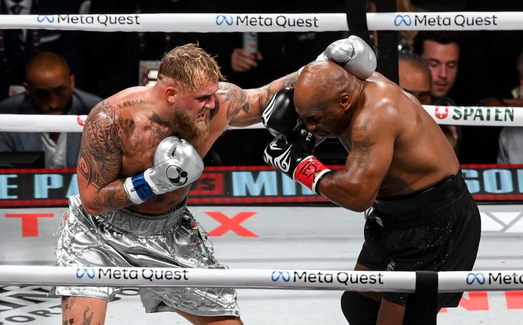 Jake Paul punches Mike Tyson
