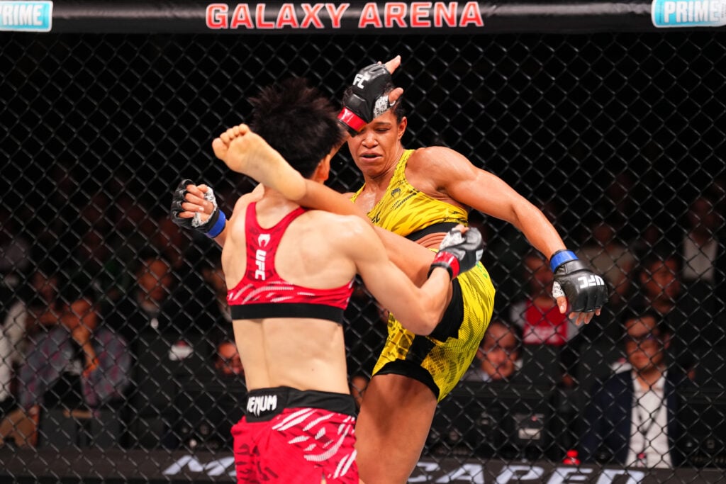 Gabriella Fernandes kicks Wang Cong during UFC Macau