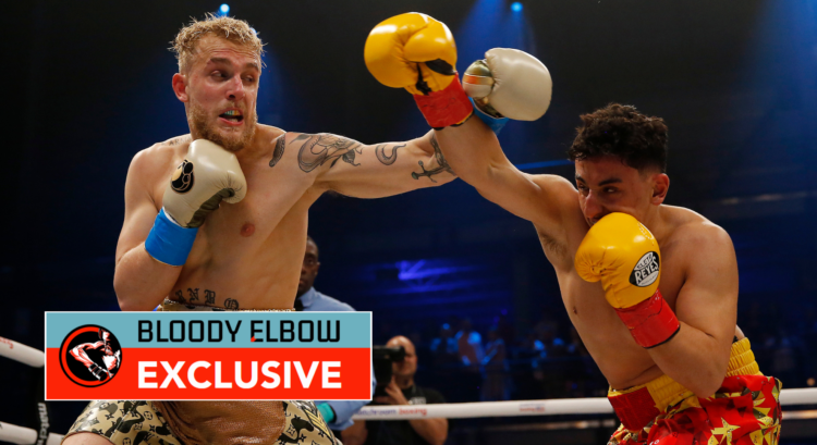 Jake Paul punches AnEsonGib during their fight at Meridian at Island Gardens on January 30, 2020 in Miami, Florida