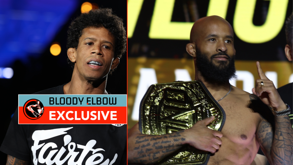Adriano Moraes and Demetrious Johnson with exclusive banner
