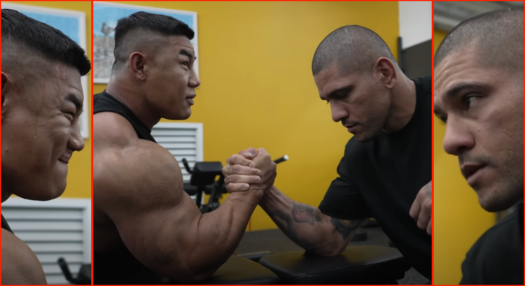Alex Pereira arm wrestling with Kim Kang Min