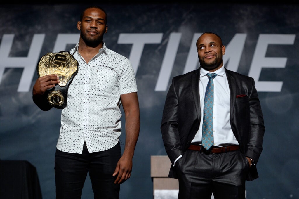 Jon Jones and Daniel Cormier pose for the media during the UFC Time Is Now press conference