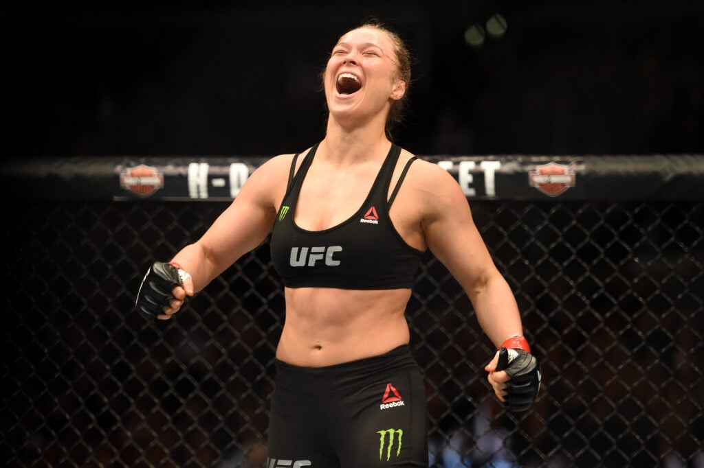 Ronda Rousey celebrates after beating Cat Zingano at UFC 184.