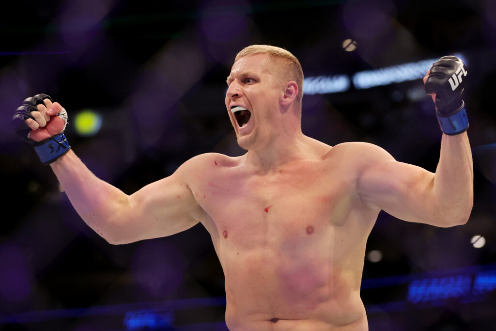 Sergei Pavlovich celebrates his victory at UFC 277