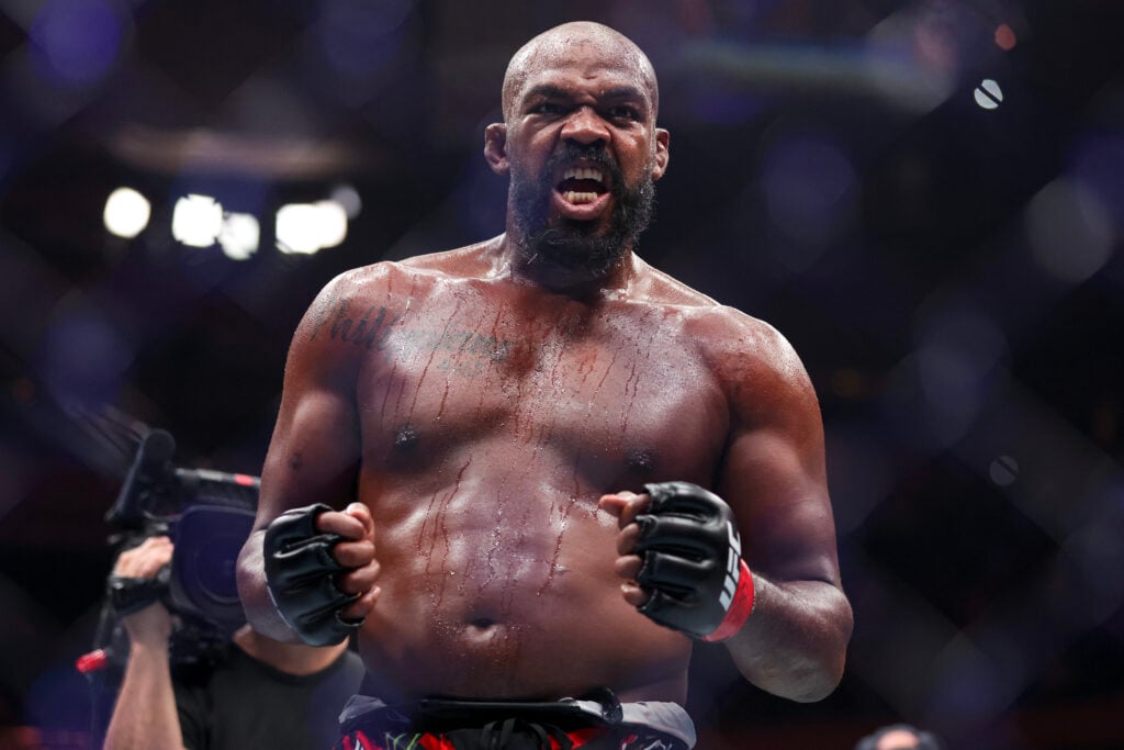 Jon Jones celebrates his win at UFC 309