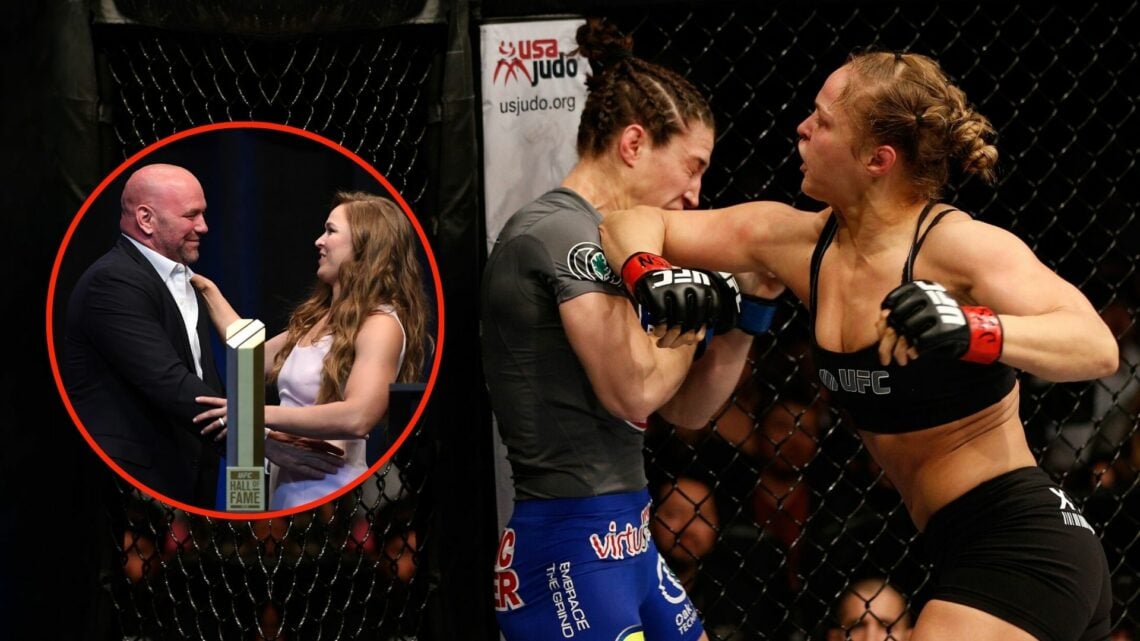 Ronda Rousey (right) elbows Sara McMann in their women's bantamweight championship bout during UFC 170 inside the Mandalay Bay Events Center on Feb...