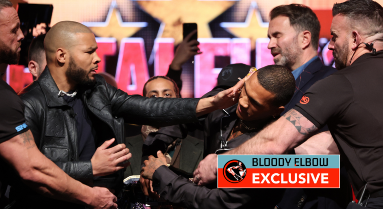 Chris Eubank Jr slaps Conor Benn with an egg as Eddie Hearn interjects. Overlay text reads: BLOODY ELBOW EXCLUSIVE