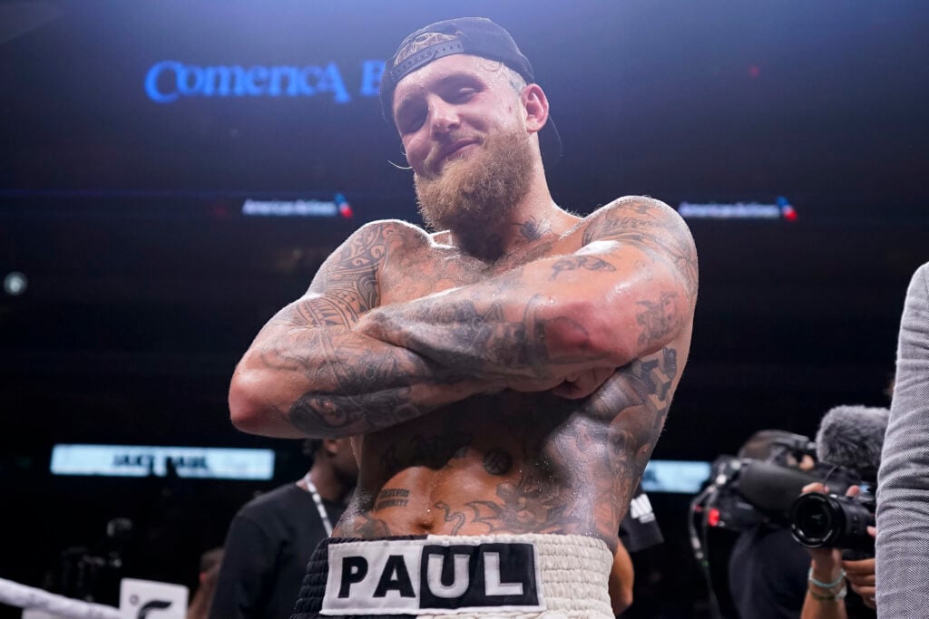Jake Paul poses for a photo after beating Nate Diaz
