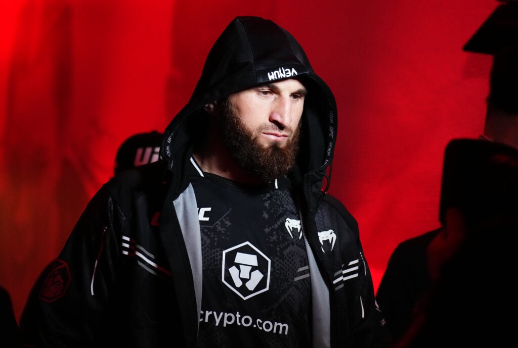 Magomed Ankalaev in his black cloaked walk-out gear, making his way to the UFC Octagon.
