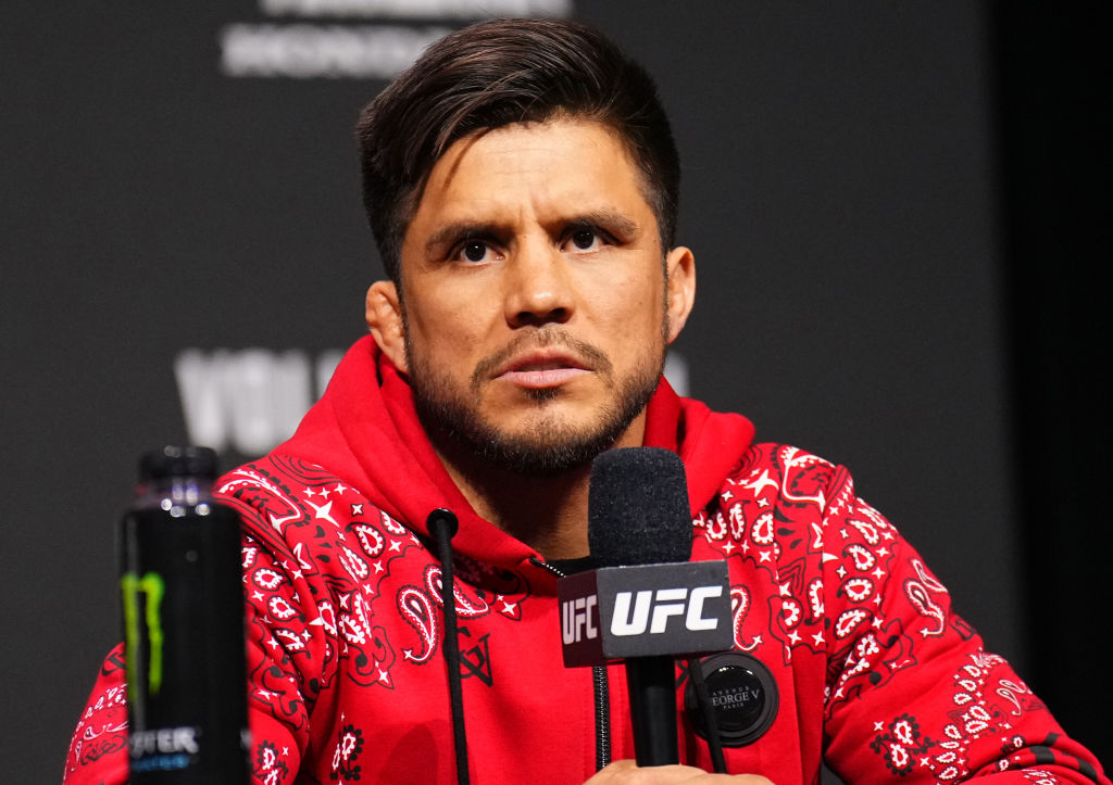 Henry Cejudo on stage at the UFC 298 press conference