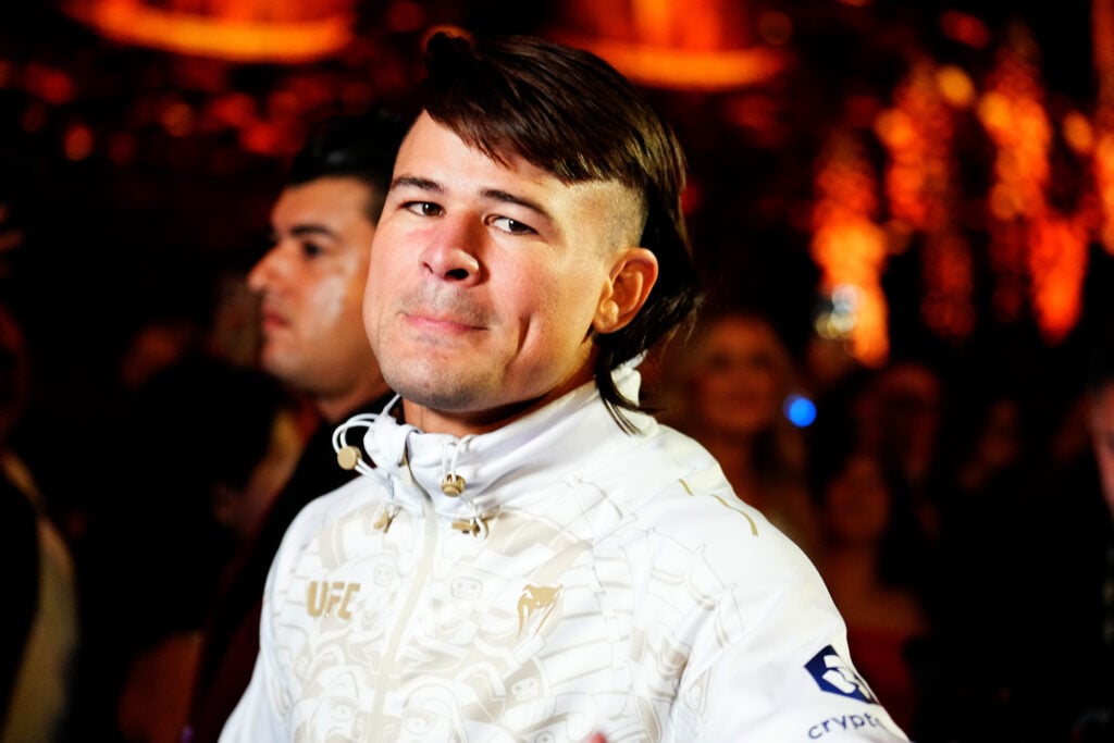 Diego Lopes walking out at UFC 306.