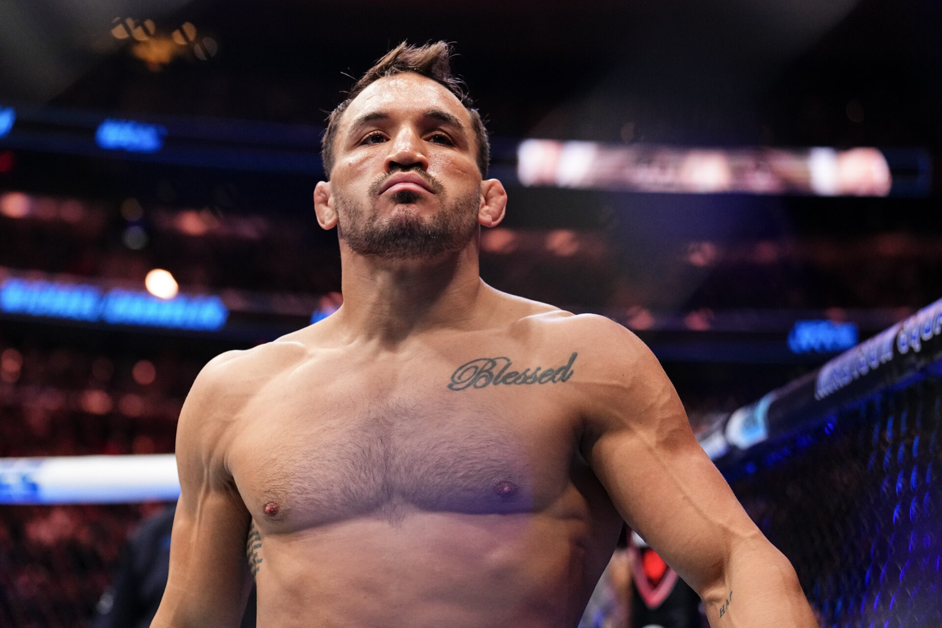 Michael Chandler poses in his corner as he prepares to fight at UFC 309.