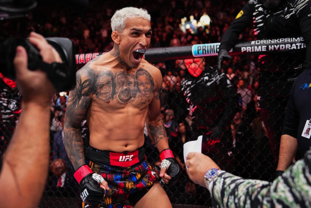 Charles Oliveira reacts during his fighter intro for his fight with Michael Chandler at UFC 309