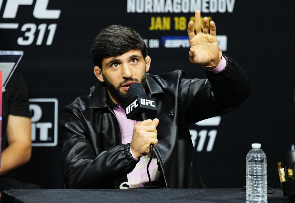 Arman Tsarukyan acknowledges the crowd during the UFC 311 press conference