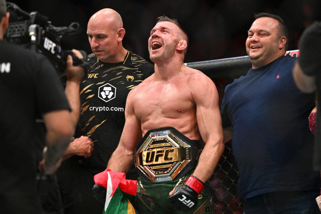 Dricus Du Plessis celebrates with his UFC title belt after UFC 312
