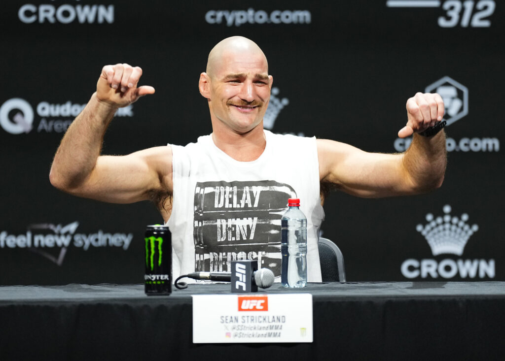 Sean Strickland gives a thumbs down at the UFC 312 Press Conference