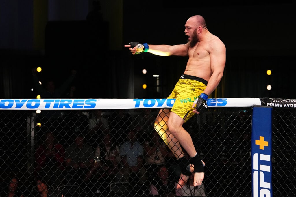 Valter Walker celebrates after submitting Don'Tale Mayes at the UFC Apex
