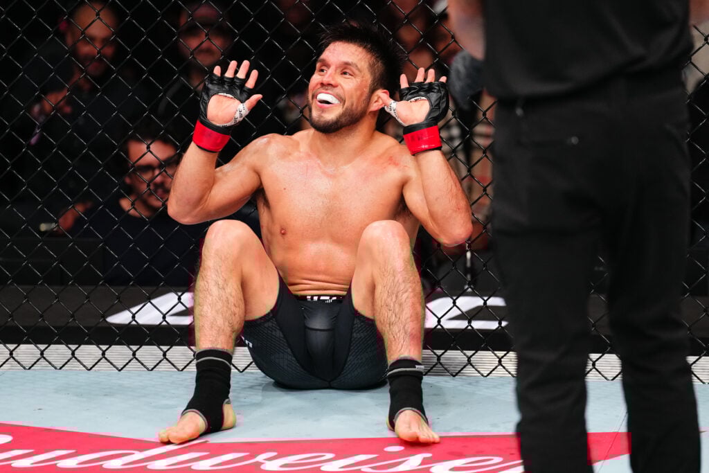 Henry Cejudo puts his hands up after calling stop to UFC Seattle main event