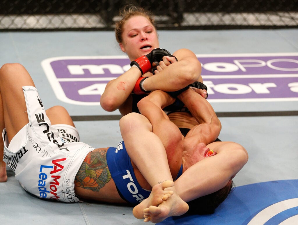 Ronda Rousey locking in an arm bar