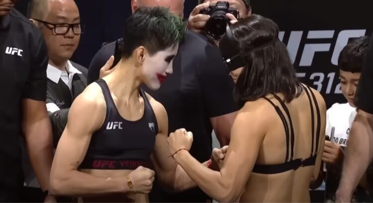 Image of Wang Cong and Bruna Brasil face off