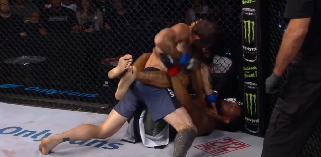 Vladimir Kanunnikov grabs the throat of Paulo Henrique at LFA 201.