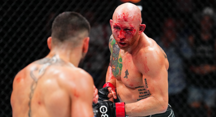 Ilia Topuria and Josh Emmett fight during their UFC headliner.