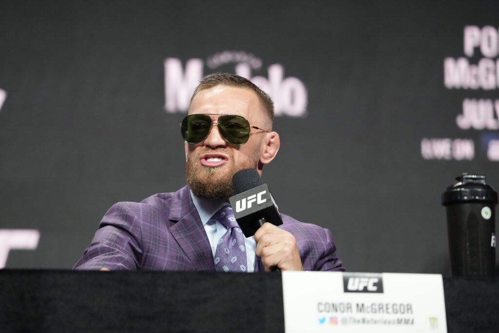 Conor McGregor speaks to the media during the UFC 264 pre-fight press conference.