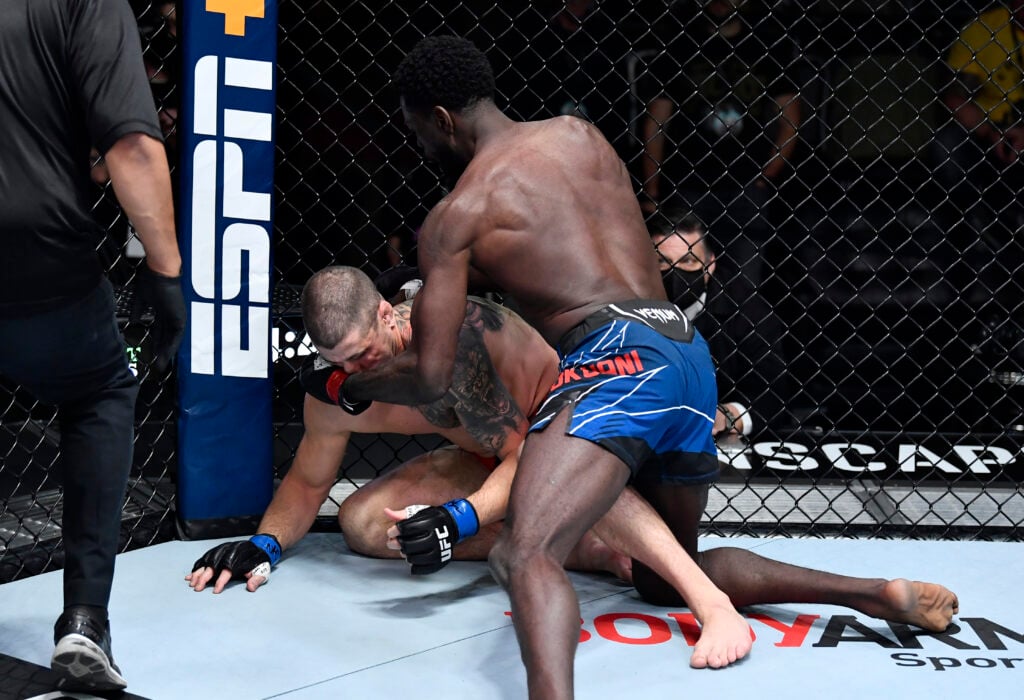 Chidi Njokuani punches Marc-Andre Barriault at UFC Fight Night: Hermansson vs. Strickland.