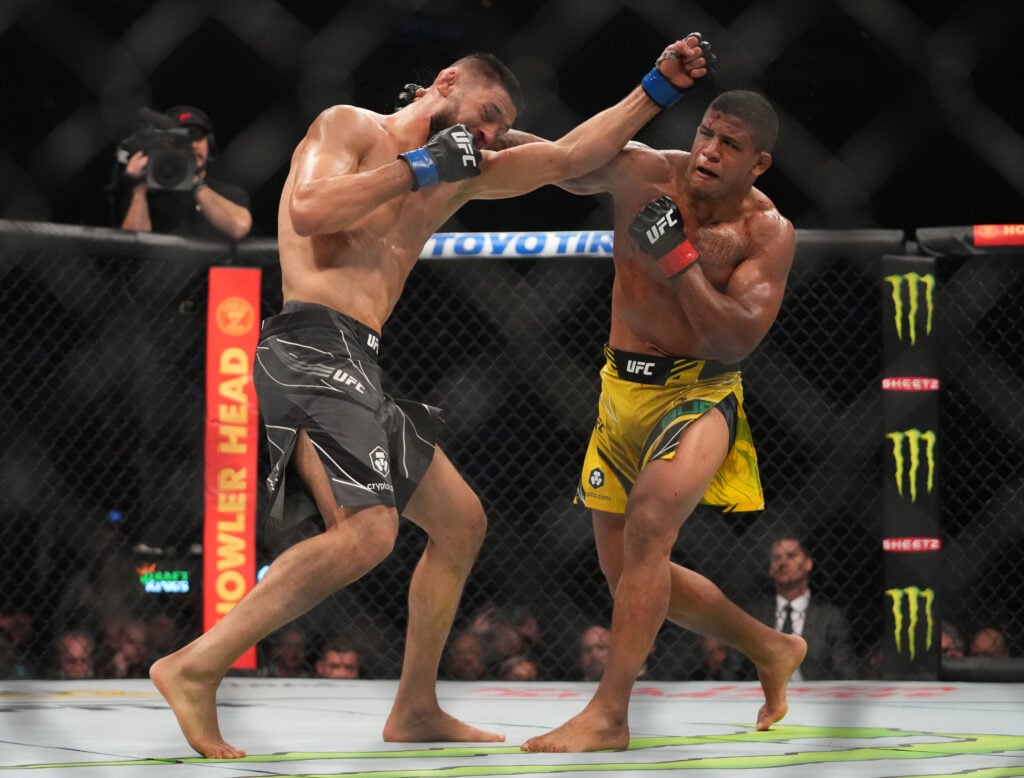 Khamzat Chimaev and Gilbert Burns exchange blows during their UFC 273 fight